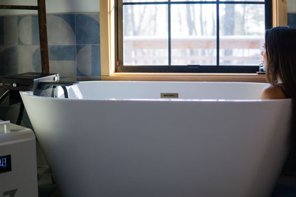 AZ-Adapt bathtub adapter pouring into freestanding tub