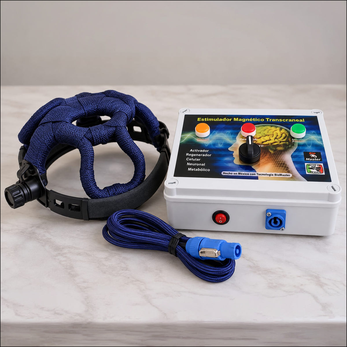 QuantumMind multi-coil TMS Helmet with control unit and braided connection cable on a marble surface